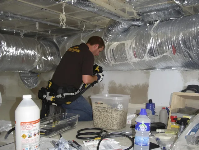 Wilmington Air Duct Cleaning specialist performing professional mold removal from air ducts in Wilmington