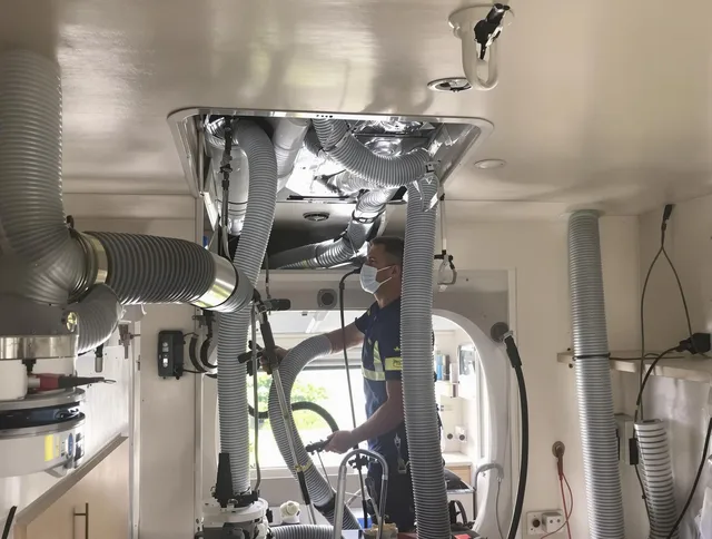 Wilmington Air Duct Cleaning specialist performing precise mobile home duct cleaning in Wilmington