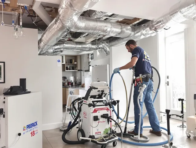 Wilmington Air Duct Cleaning technician performing advanced pure duct cleaning with specialized equipment in Wilmington